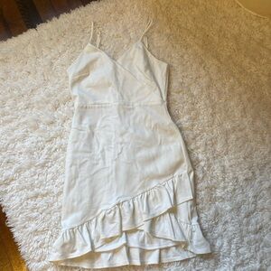 Cream lined minidress with bottom ruffle